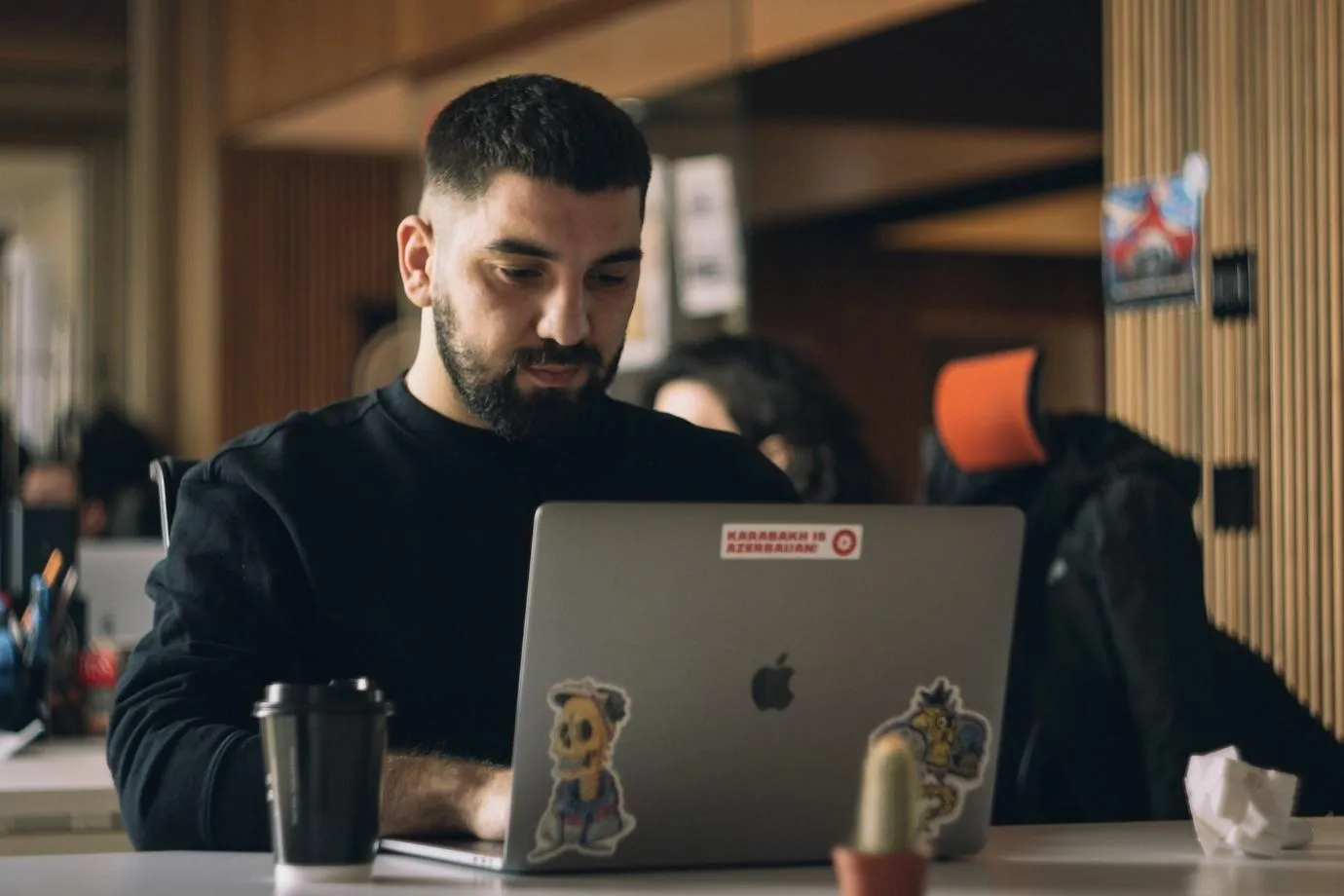 Blockchain application development A person working on a MacBook