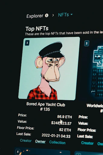 A website card showing Bored Ape Yatch Club NFT with its price, value, and last sale.