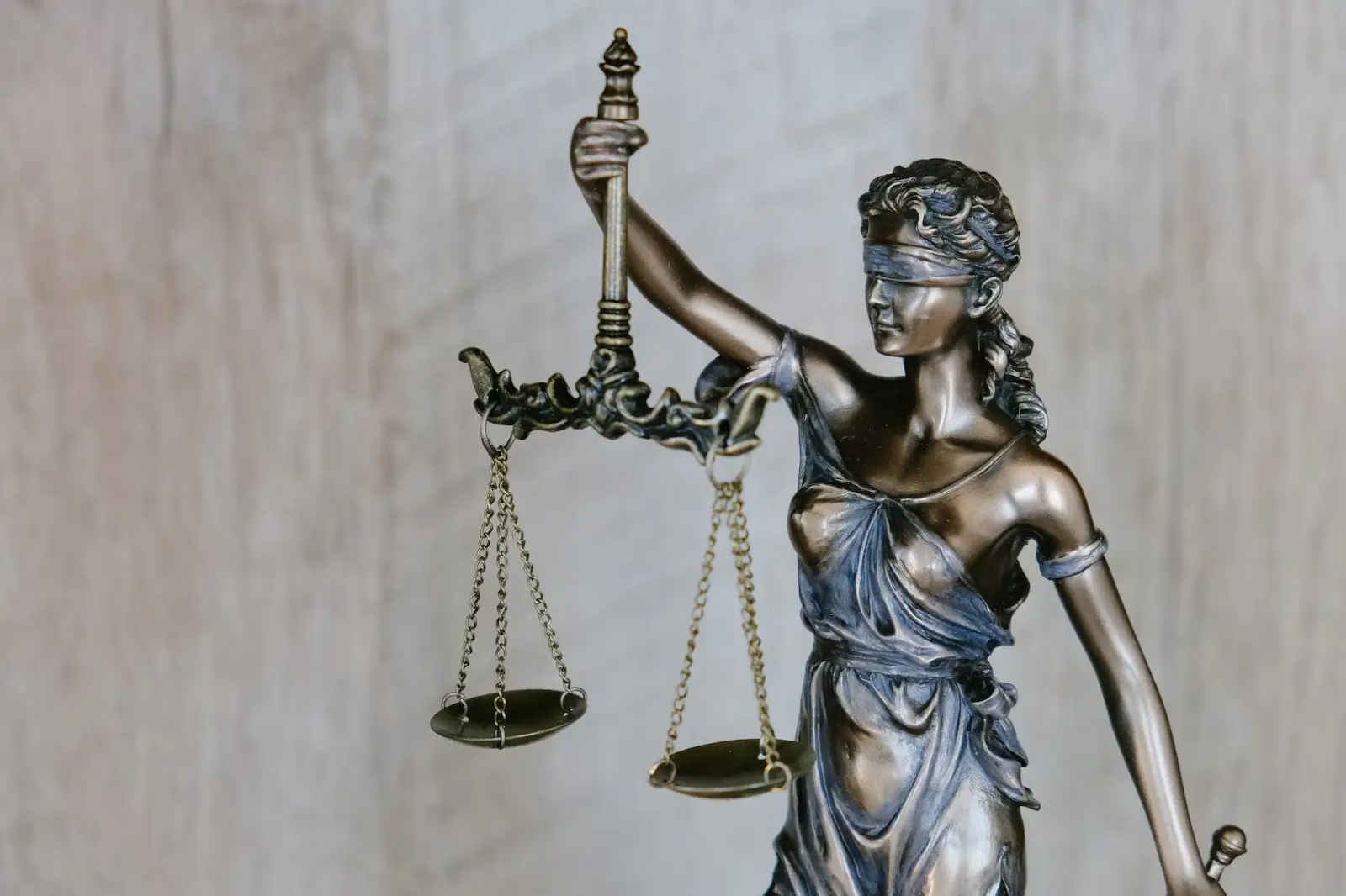  An image of a blindfolded lady justice