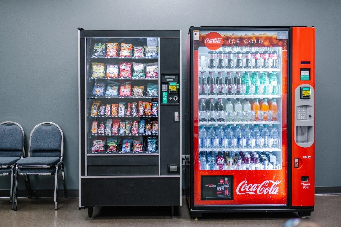 An image of two vending machines for snacks (left) and beverages (right)
