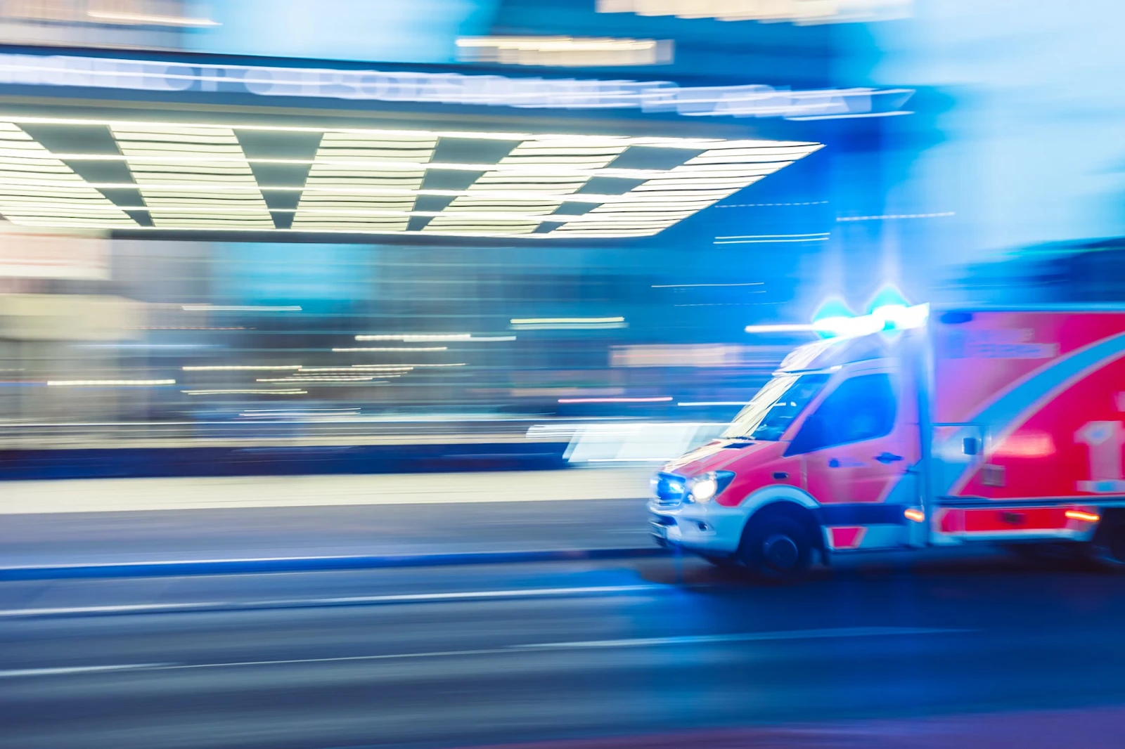 An ambulance rushing at high speed