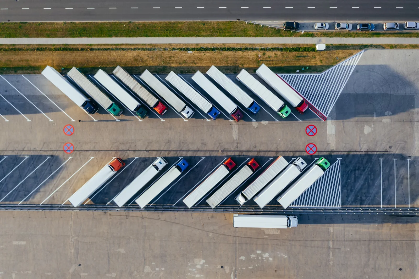 A bird’s eye view of truck trailers at the truck parking area